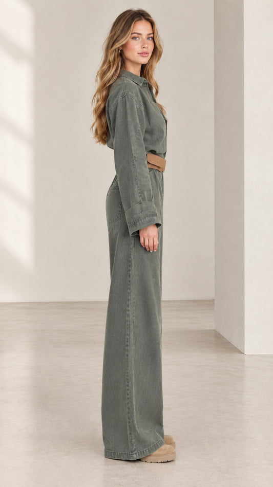 Side view of women's olive green wide leg jumpsuit showing relaxed silhouette
